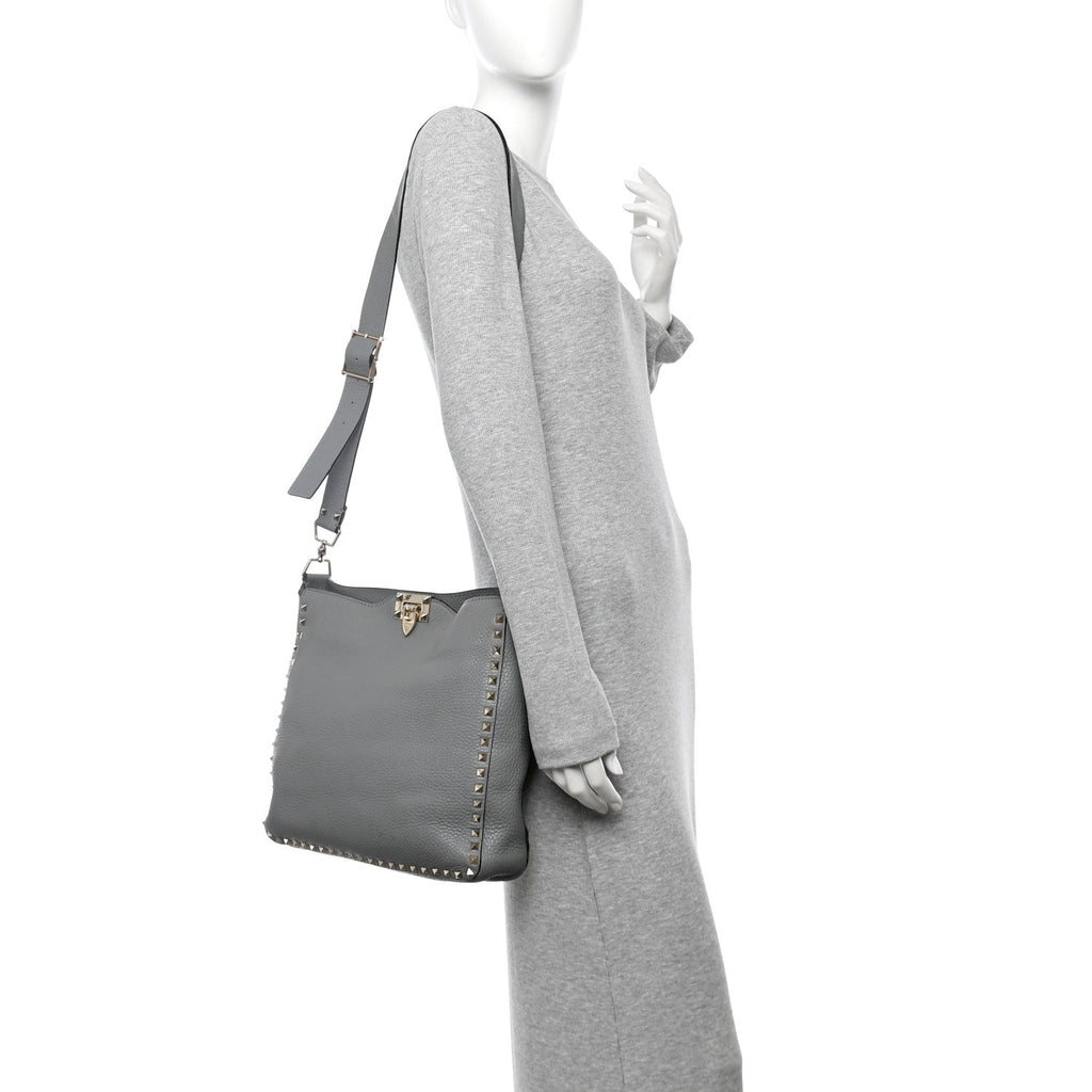 Pebbled Calfskin Small Rockstud Flip-Lock Messenger Bag Light Stone
