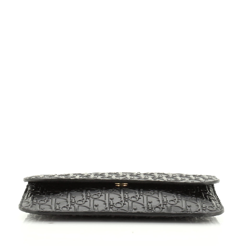 Wristlet Flap Clutch Oblique Embossed Leather