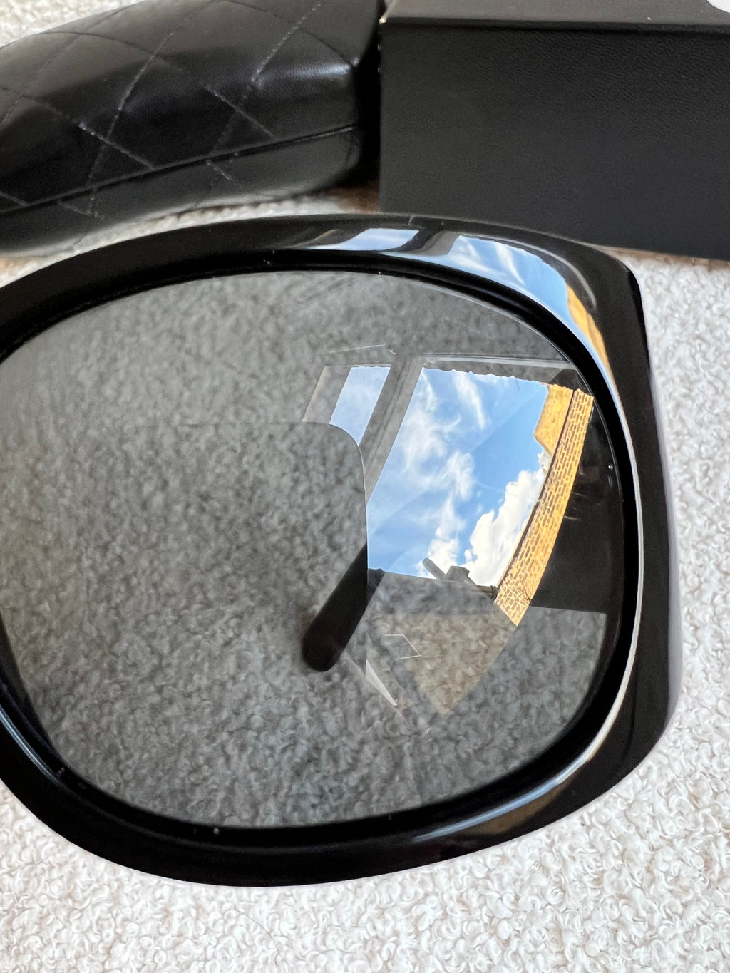 Chanel Black Sunglasses with diamanté details
