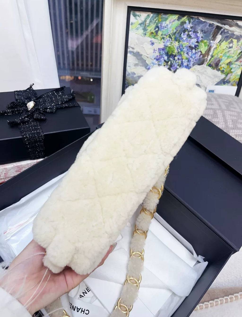 Chanel 24K off-white shearling chain flap bag with gold hardware