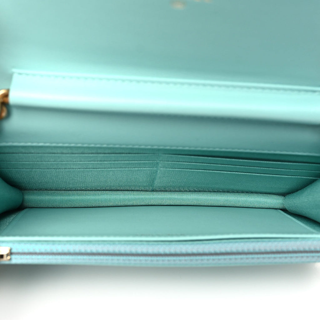 Caviar Quilted Boy Wallet On Chain WOC Light Blue