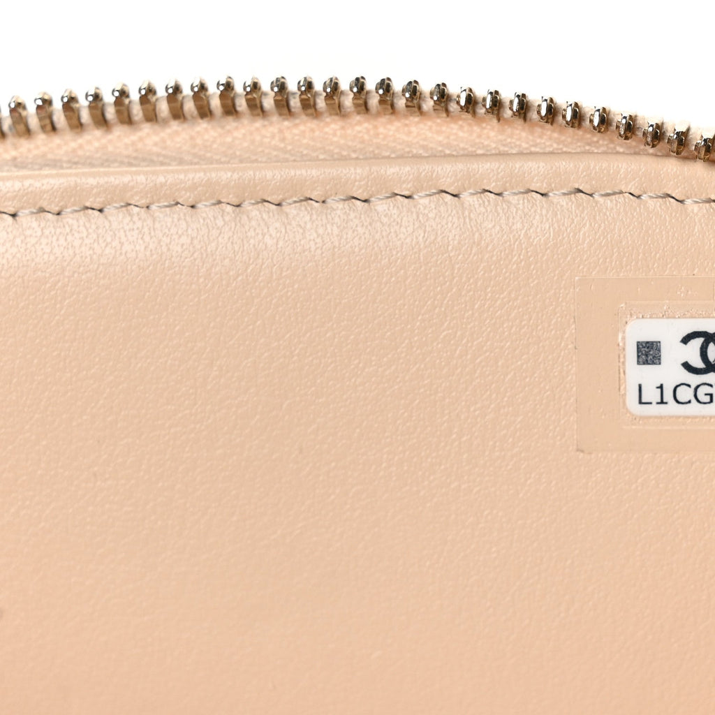 Caviar Quilted Top Handle Vanity Case Light Beige