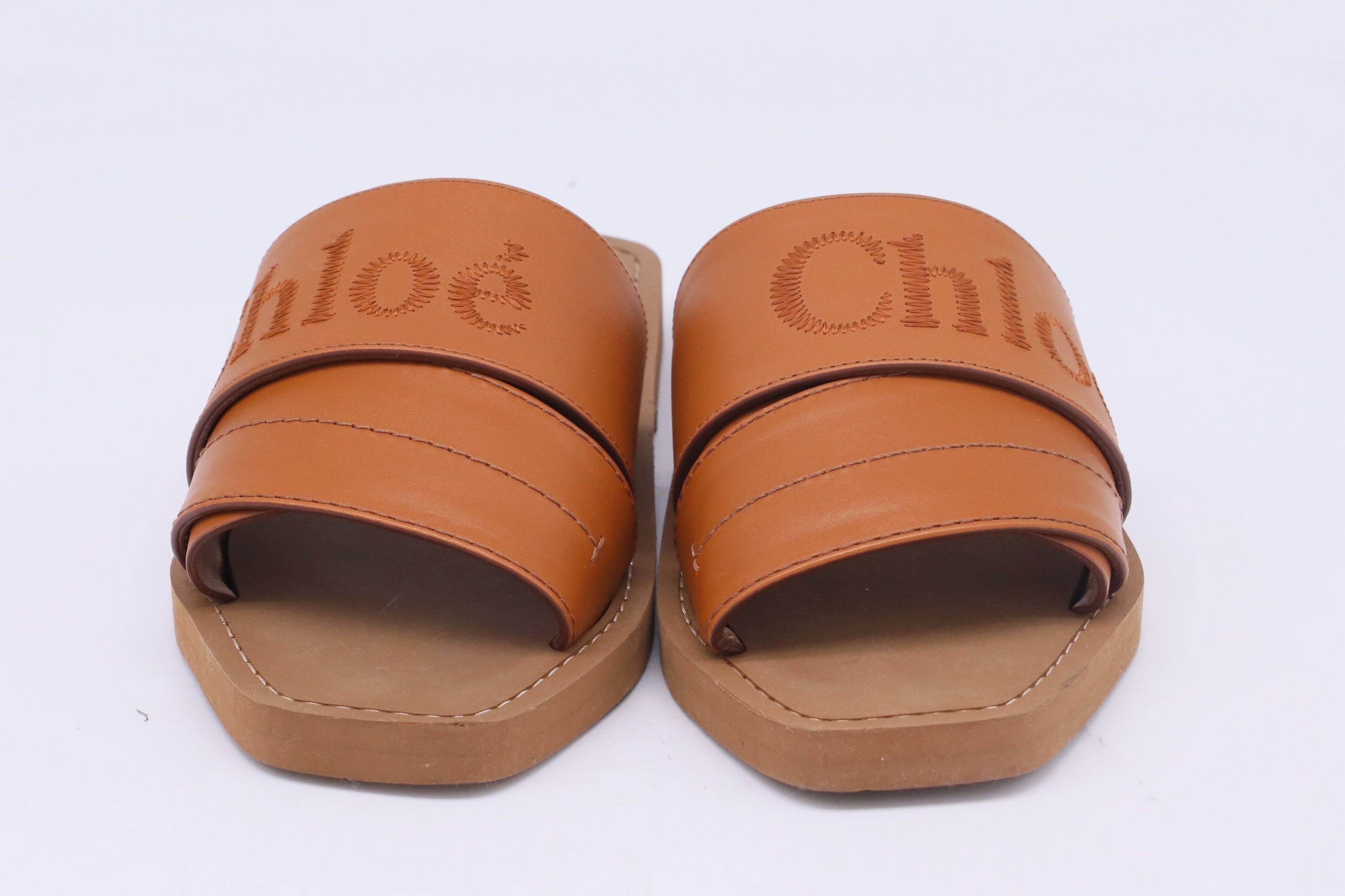 Chloé Woody Embroidered Logo Flat Sandals in Brown Leather
