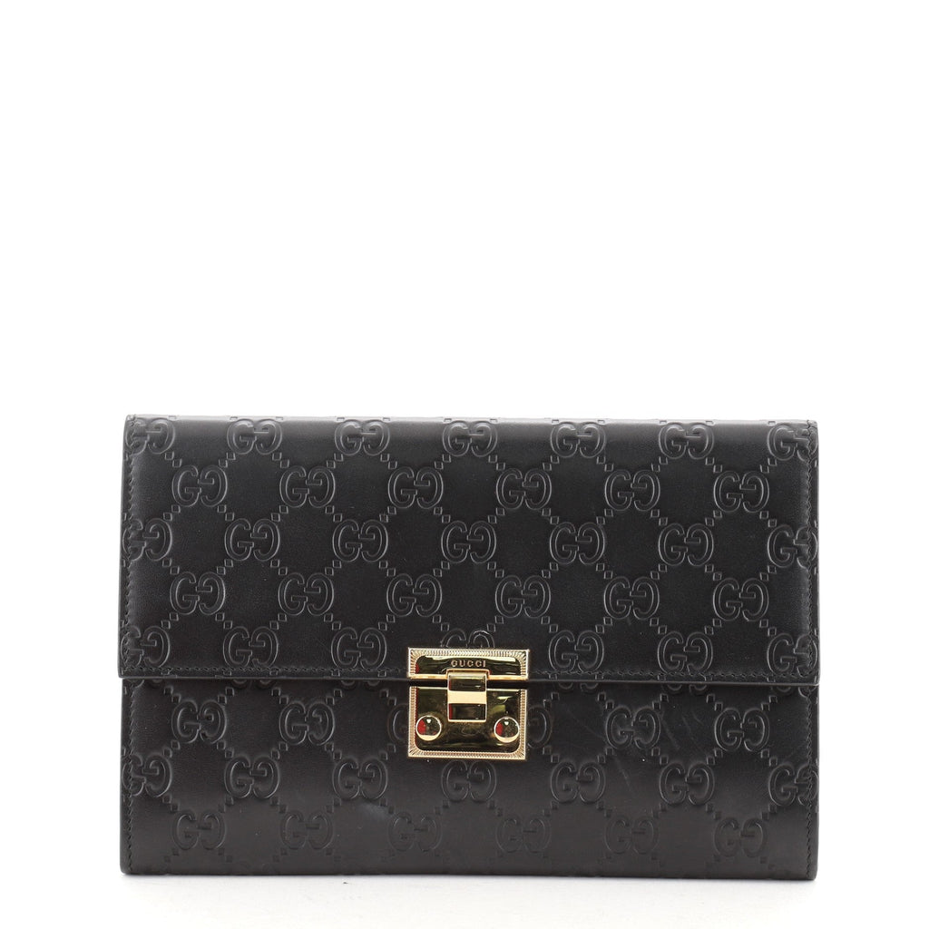 Padlock Clutch Guccissima Leather