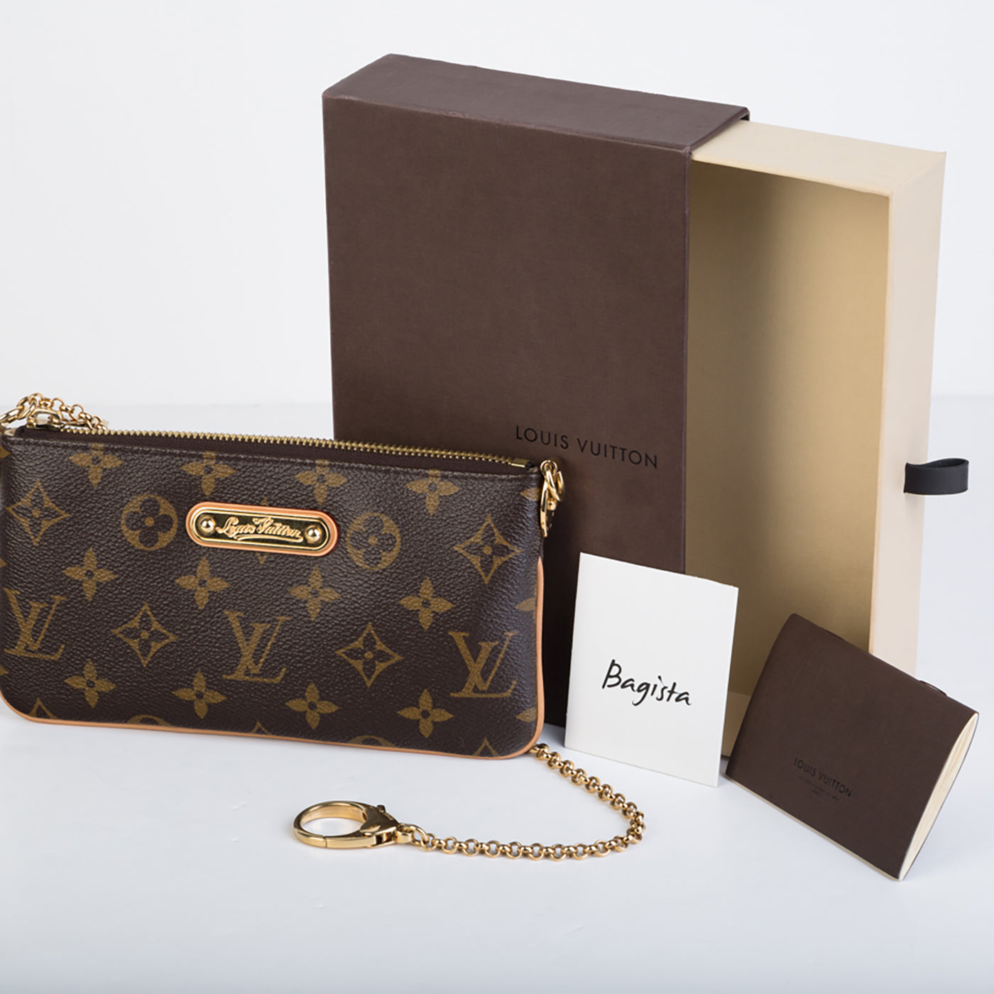 Louis Vuitton Milla Clutch