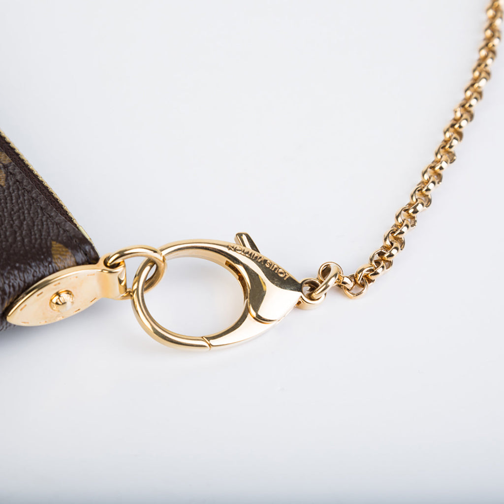 Louis Vuitton Milla Clutch