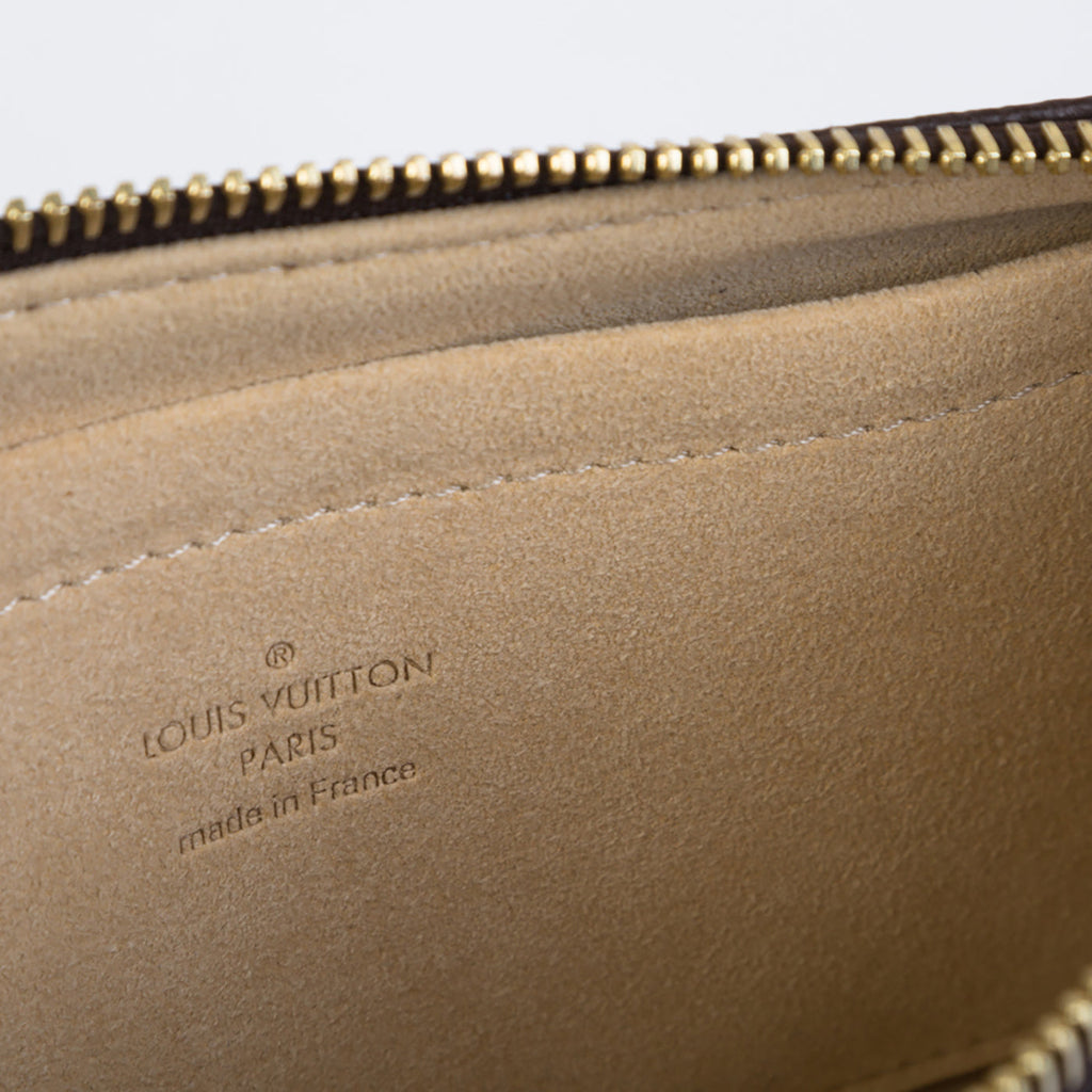 Louis Vuitton Milla Clutch