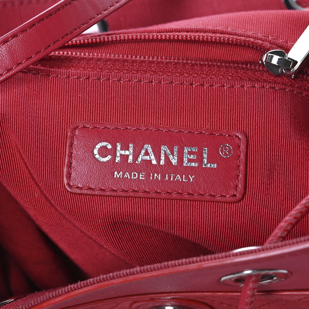 Crumpled Grained Calfskin Quilted Backpack Red