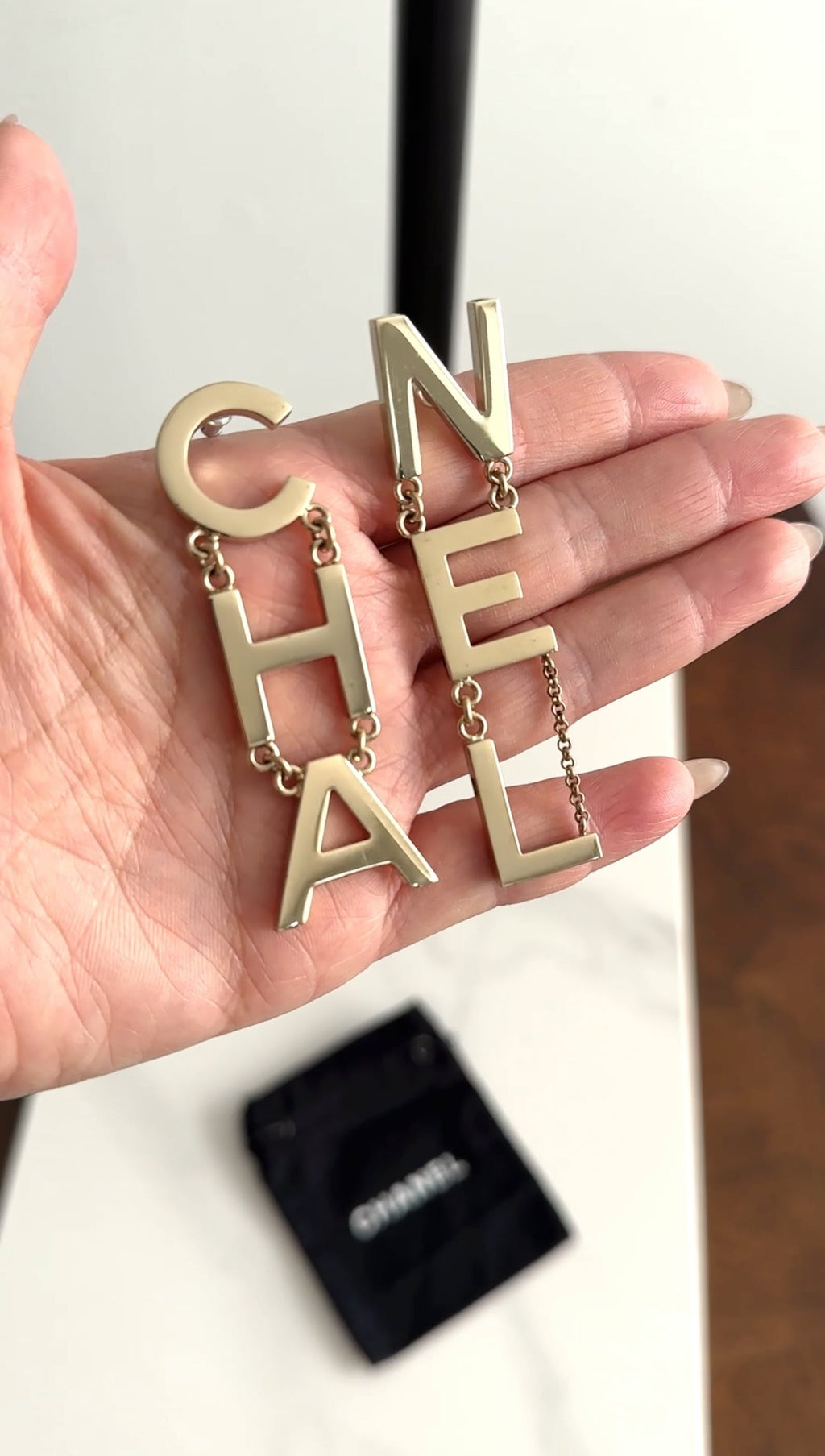 Chanel 19S Light Goldtone Spellout Logo Drop Earrings