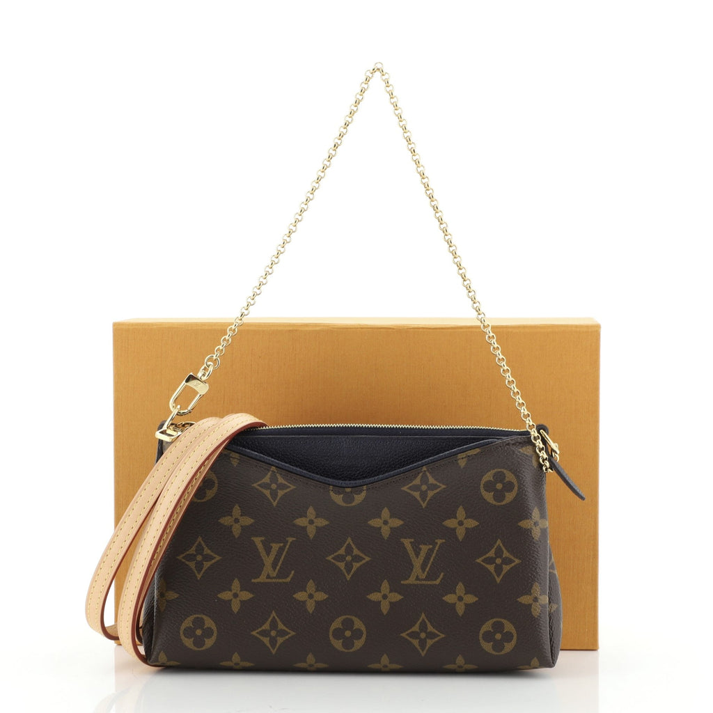 Pallas Clutch Monogram Canvas