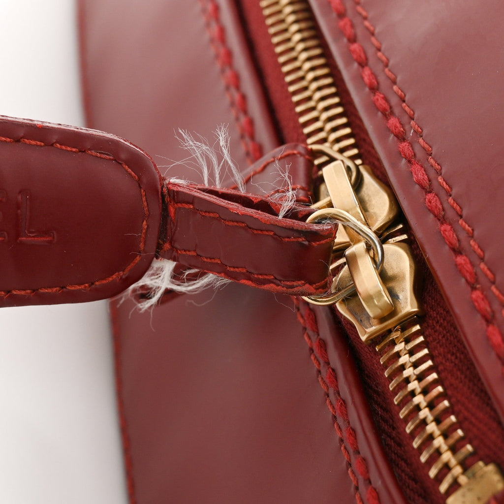 Calfskin Stitch Surpique Bowler Red