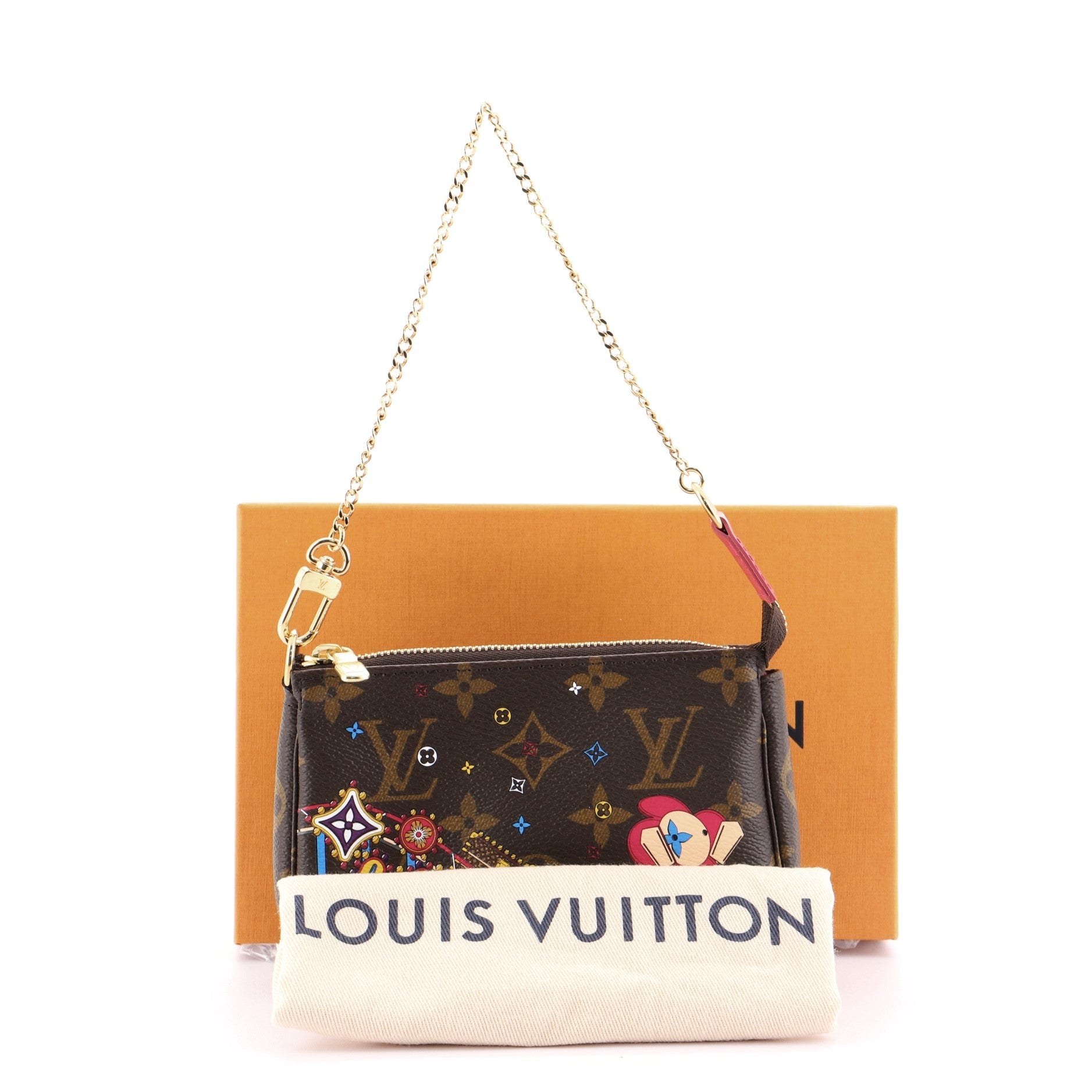 Pochette Accessoires Limited Edition Vivienne Xmas Monogram Canvas Mini