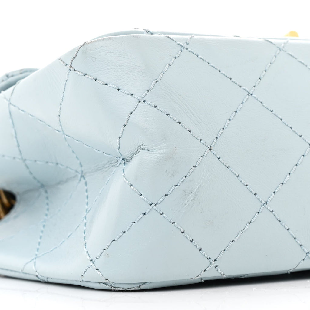 Aged Calfskin Quilted 2.55 Reissue Mini Flap Light Blue