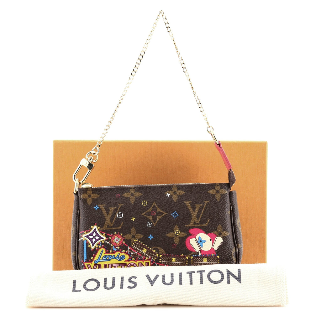 Pochette Accessoires Limited Edition Vivienne Xmas Monogram Canvas Mini