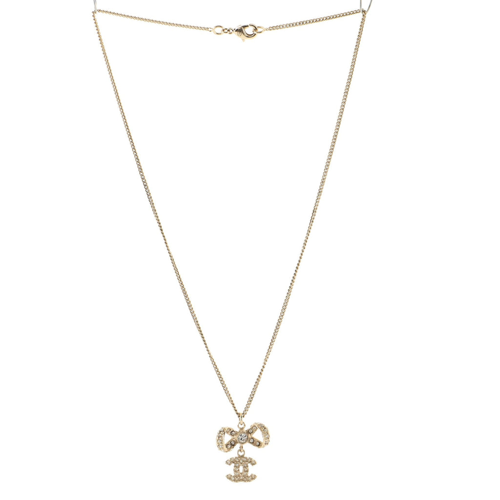 Dangling CC Ribbon Pendant Necklace Metal with Rhinestones