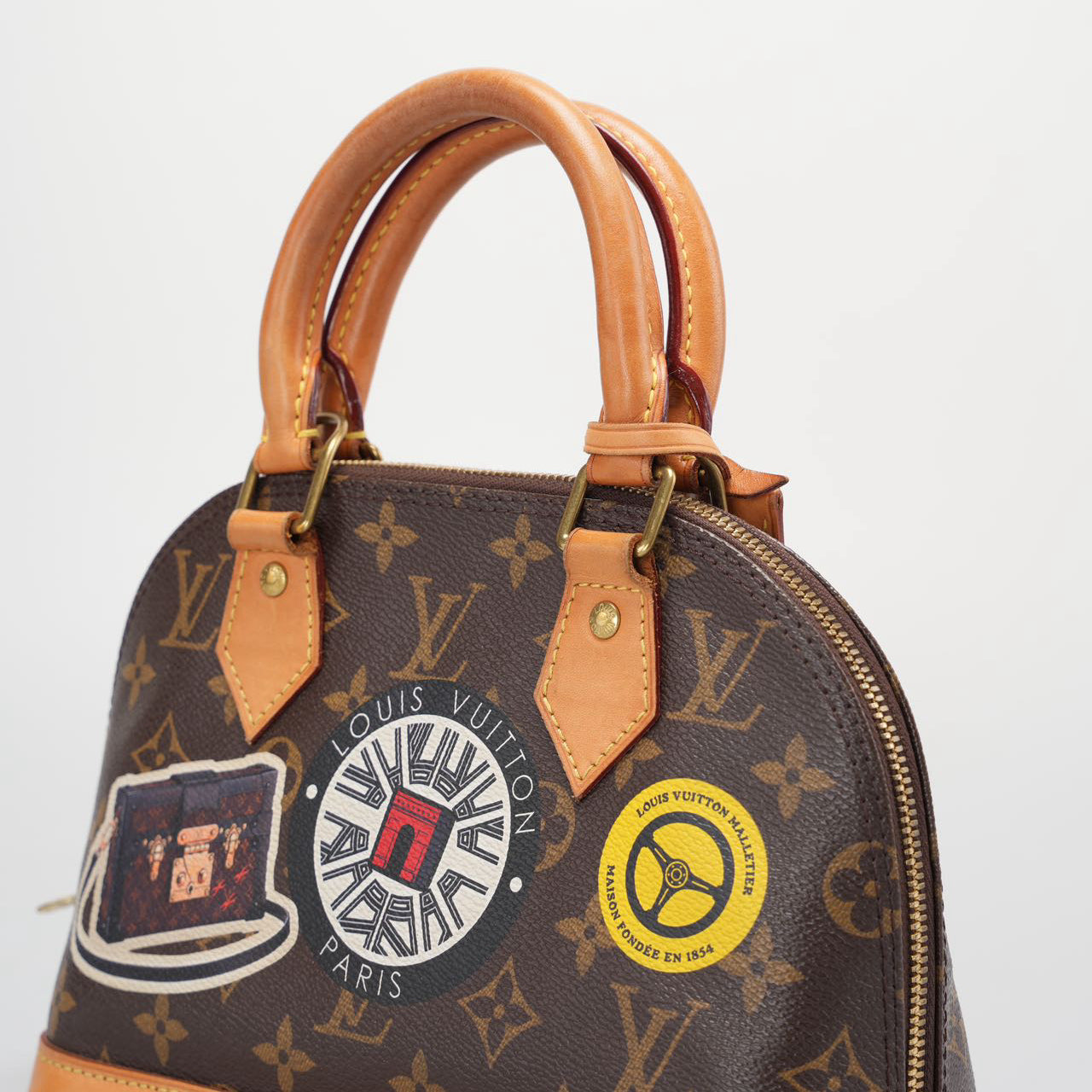Louis Vuitton Monogram World Tour Alma BB Satchel Bag