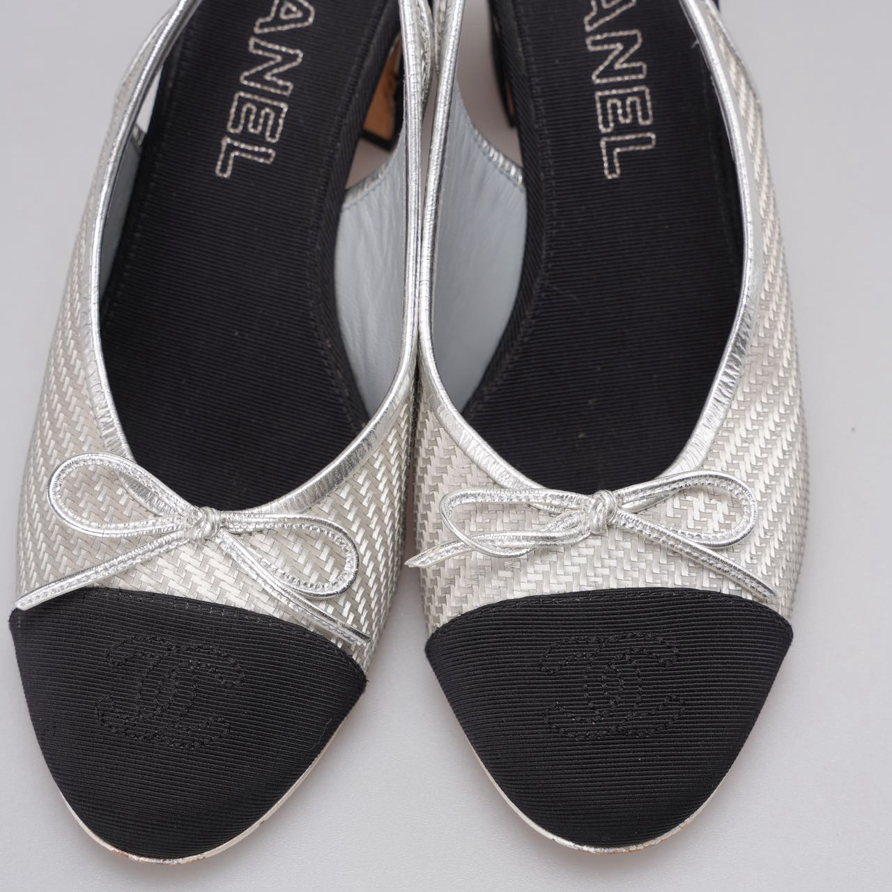 Chanel Woven Plastic Grosgrain Cap Toe CC Slingback Pumps in black and silver 39.5