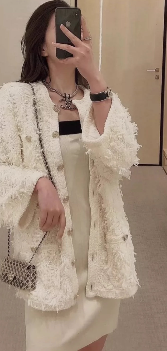Chanel 21S off-white tassel igan
