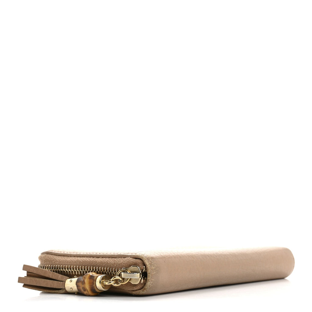 Dollar Calfskin Bamboo Tassel Zip Around Wallet Beige
