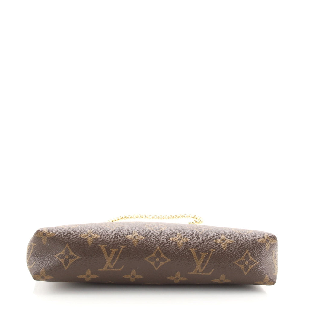 Pallas Clutch Monogram Canvas