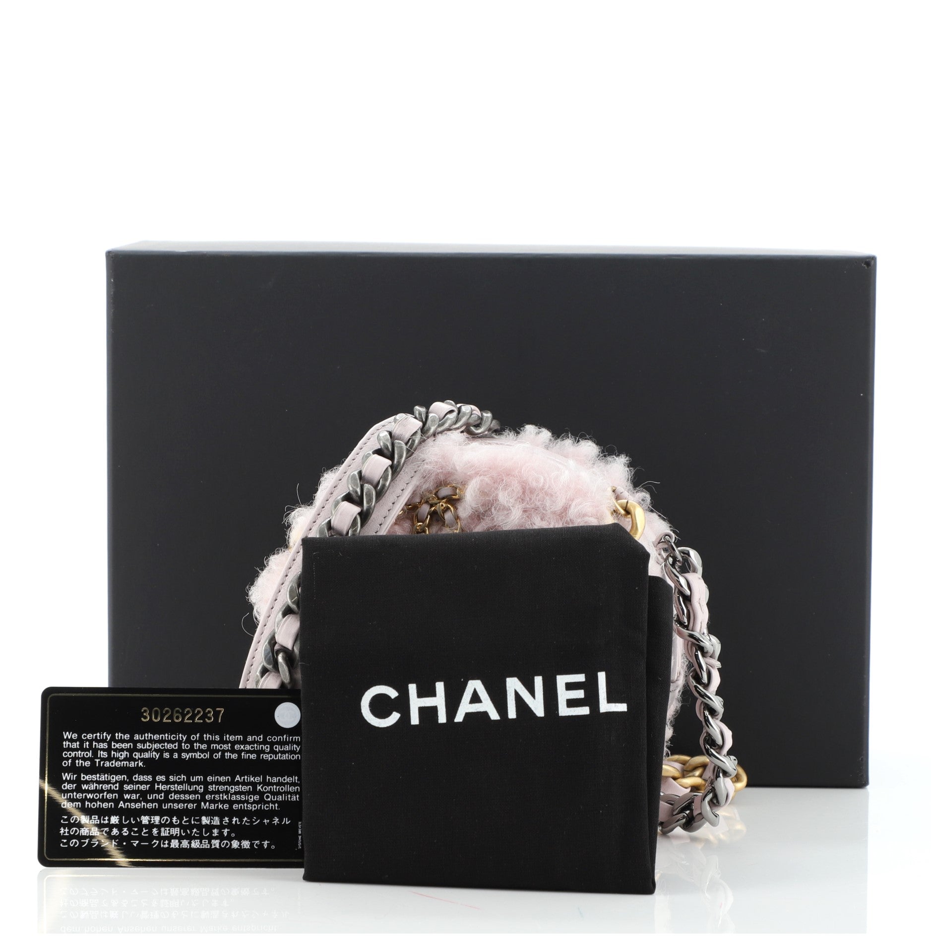19 Round Clutch with Chain Quilted Shearling