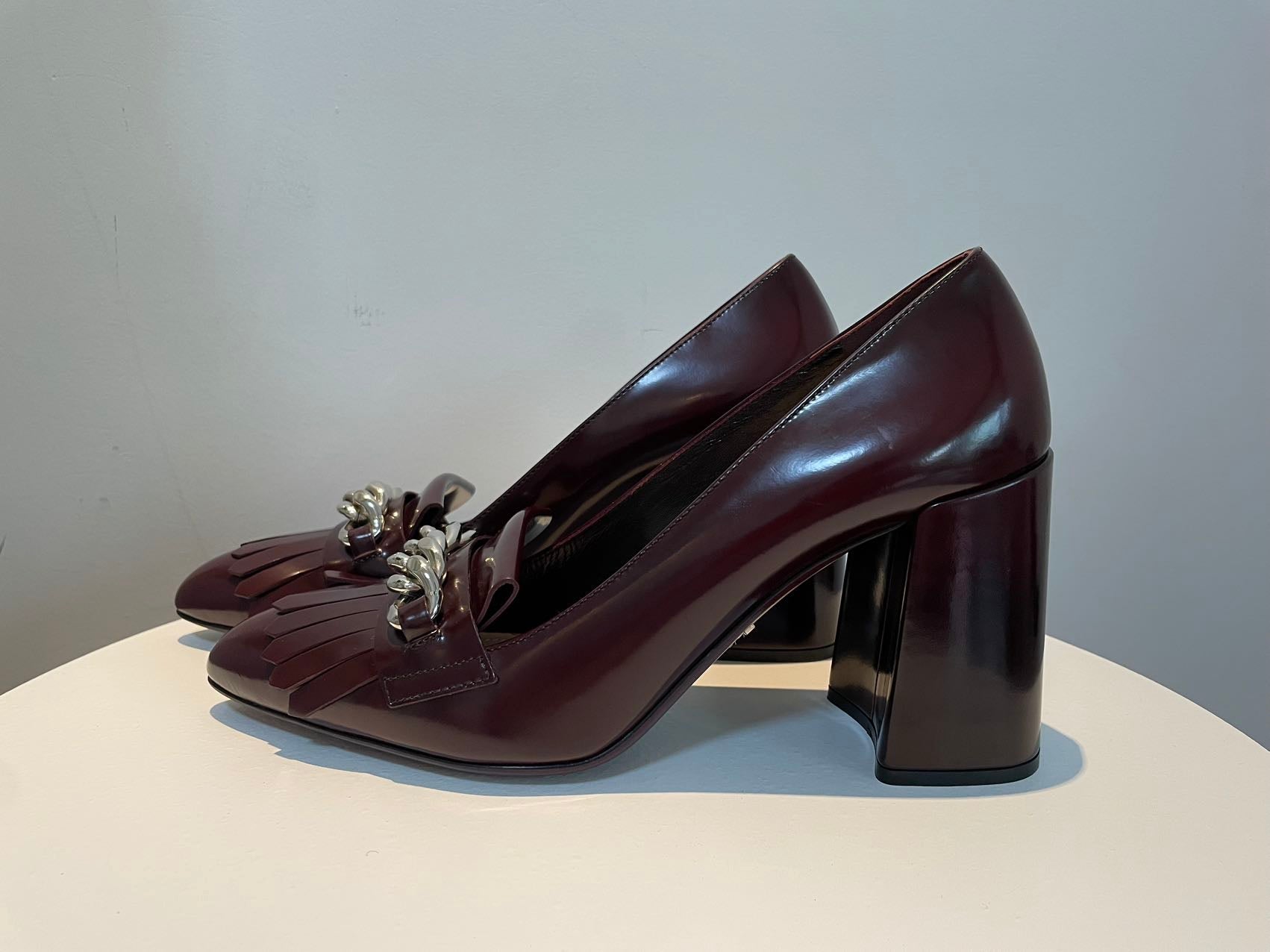 Prada Merlot Kiltie Chain Patent Leather Block-heel Pumps 39