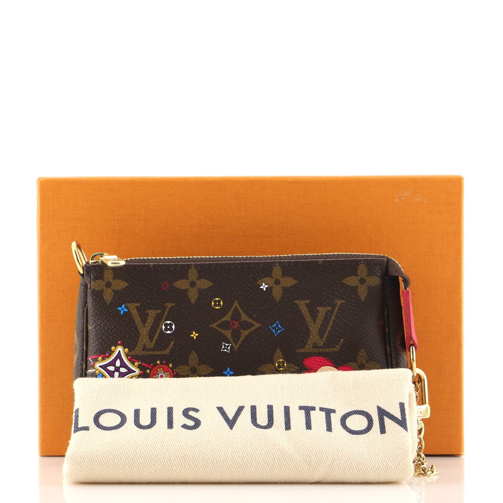 Pochette Accessoires Limited Edition Vivienne Xmas Monogram Canvas Mini