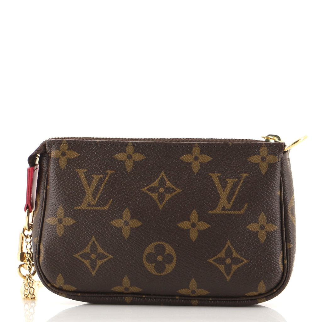 Pochette Accessoires Limited Edition Vivienne Xmas Monogram Canvas Mini