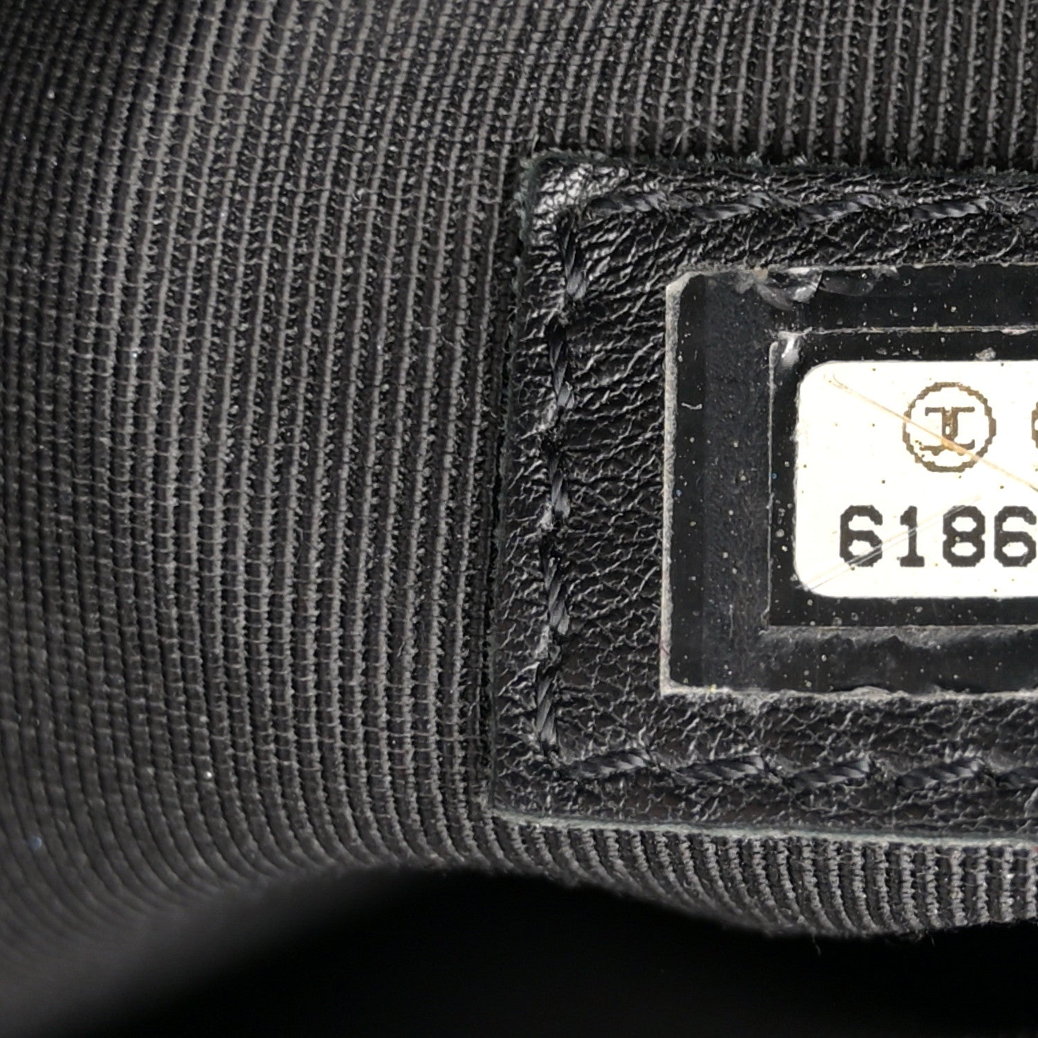 Caviar Quilted Bowler Black