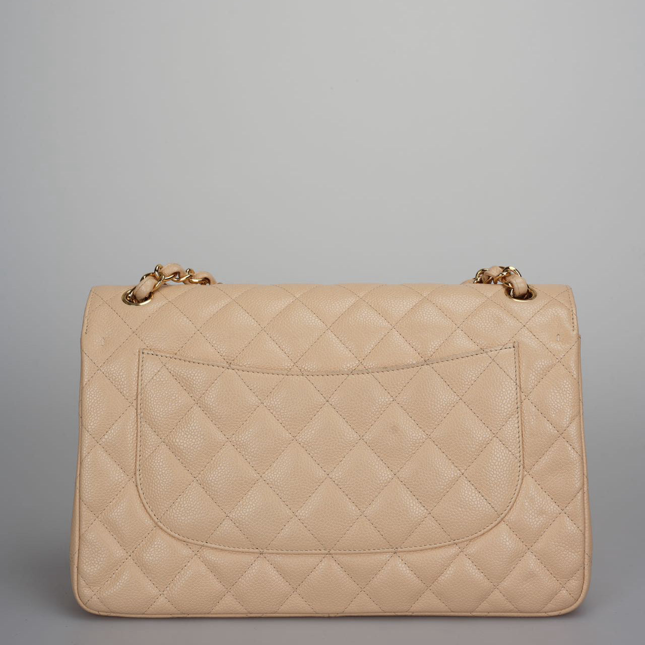 Chanel Classic Double Flap Bag Jumbo in Beige Quilted Caviar Leather with Gold Hardware