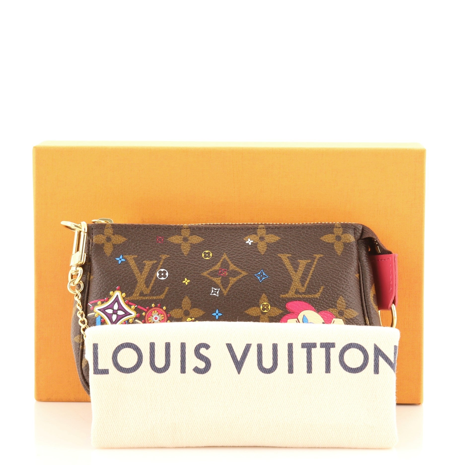 Pochette Accessoires Limited Edition Vivienne Xmas Monogram Canvas Mini