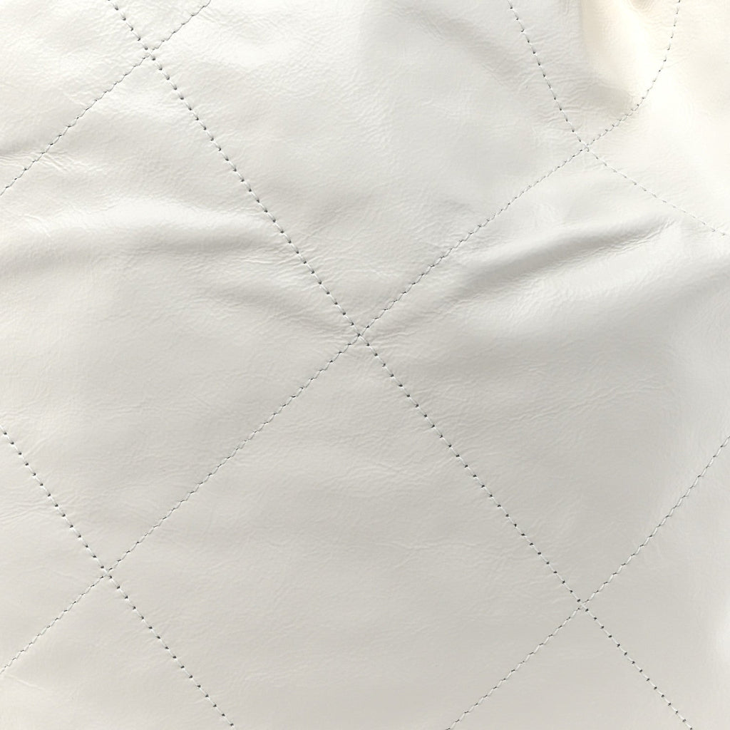 Shiny Calfskin Quilted Chanel 22 Backpack White Black