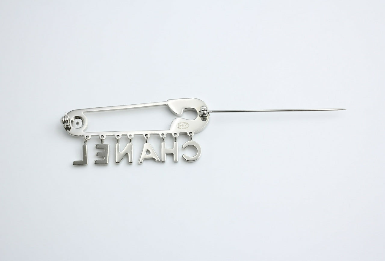 Chanel B18P Rhinestone Metal Thick ‘CHANEL’ Brooch