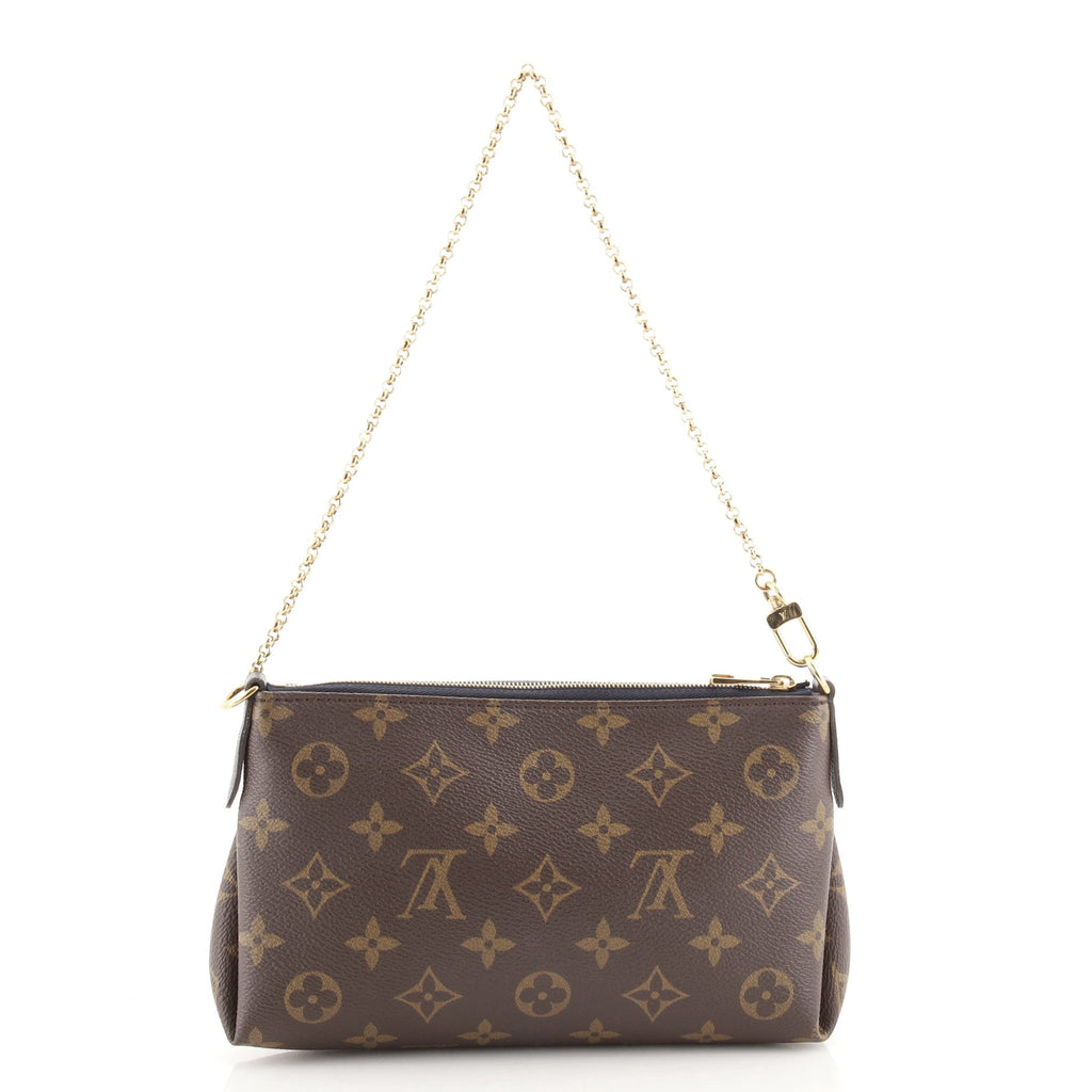 Pallas Clutch Monogram Canvas