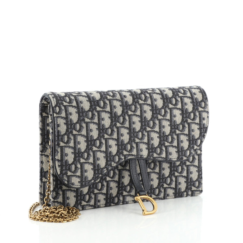 Saddle Chain Clutch Oblique Canvas