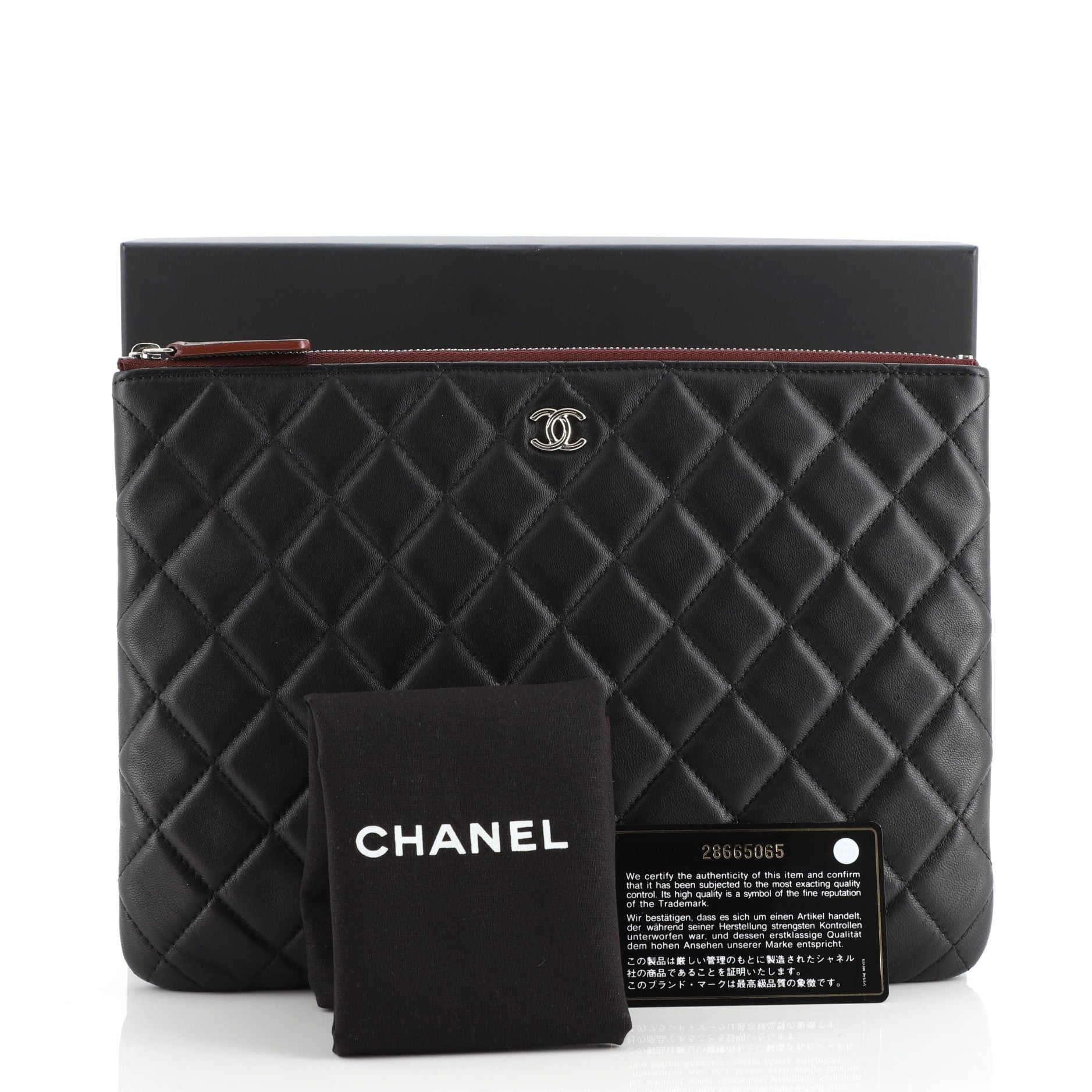 O Case Clutch Quilted Lambskin Medium