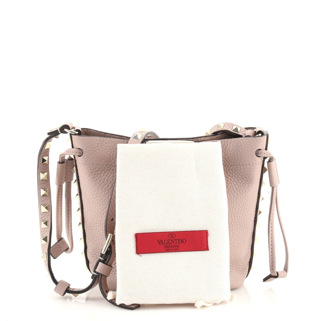 Rockstud Flip Lock Bucket Crossbody Bag Pebbled Leather Mini