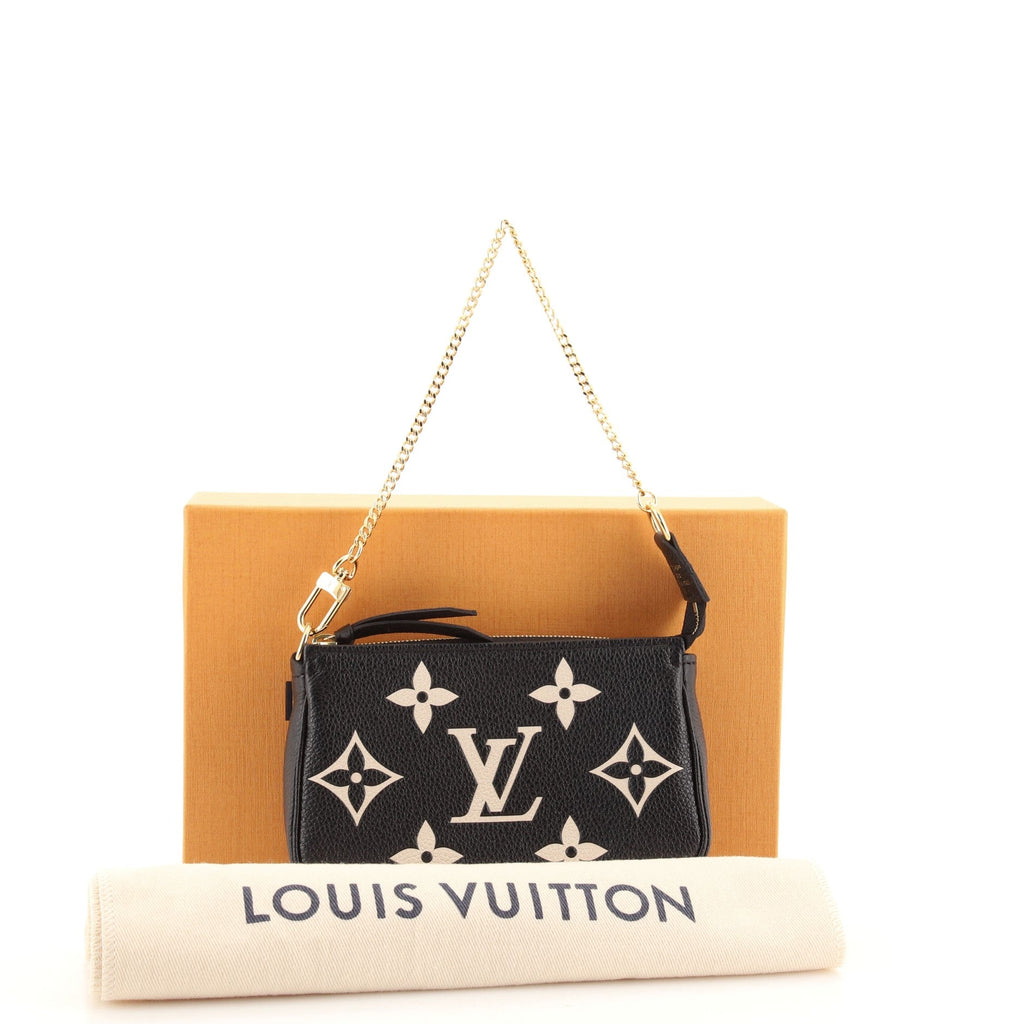 Pochette Accessoires Bicolor Monogram Empreinte Giant Mini