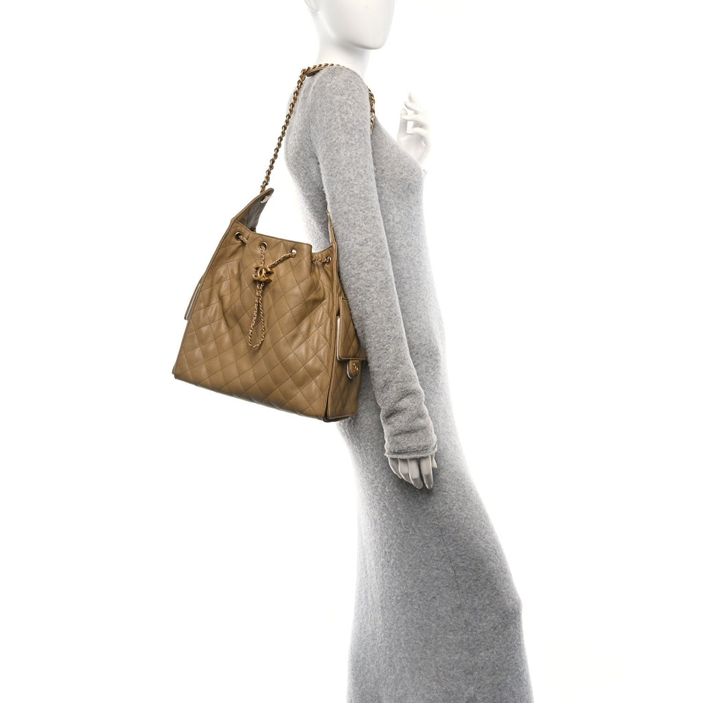 Caviar Quilted Medium Chanel 25 Handbag Dark Beige
