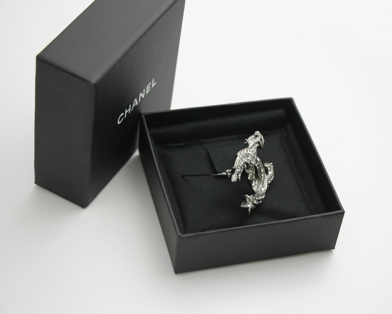 Chanel C21S Rhinestone Metal Silver Star Twist Brooch