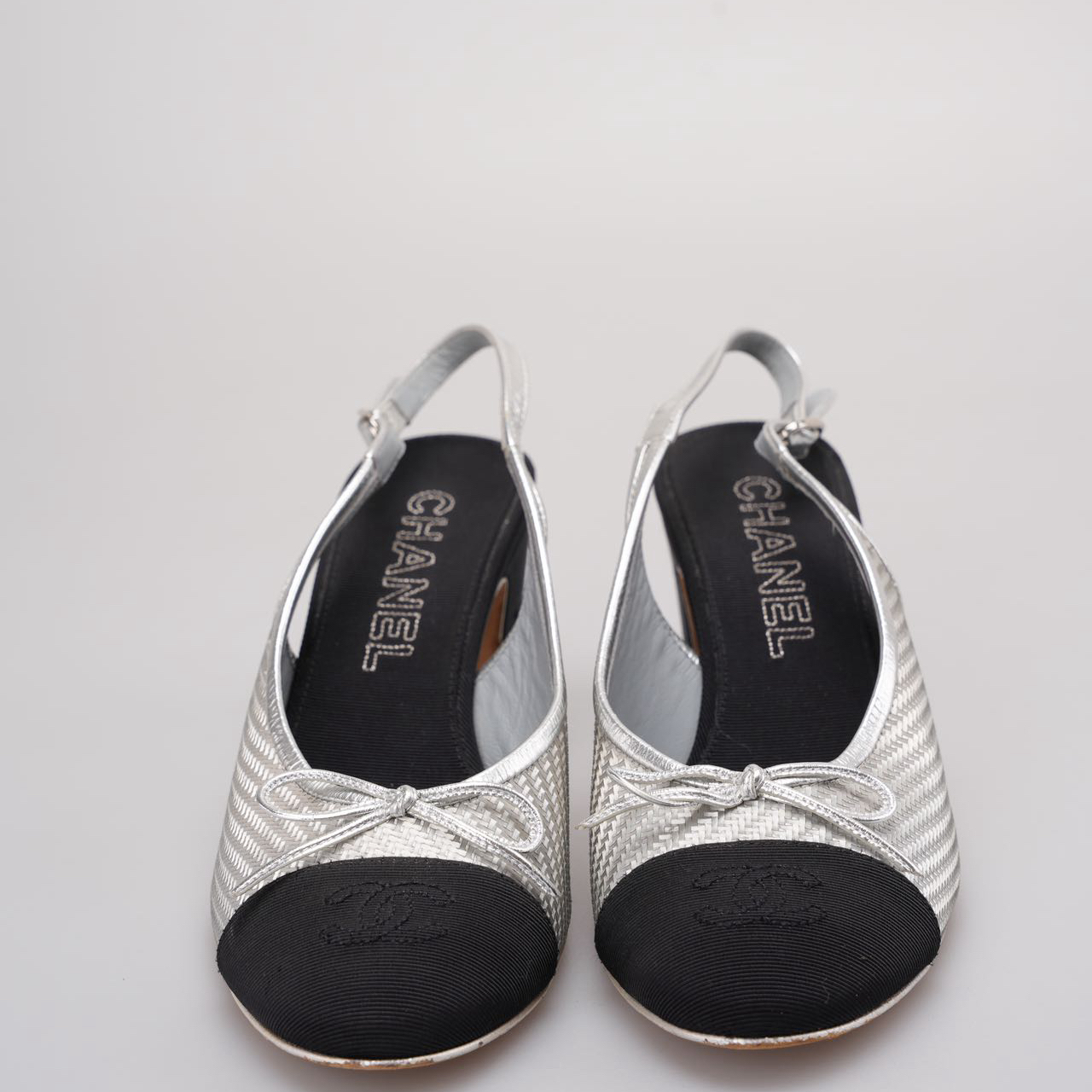 Chanel Woven Plastic Grosgrain Cap Toe CC Slingback Pumps in black and silver 39.5