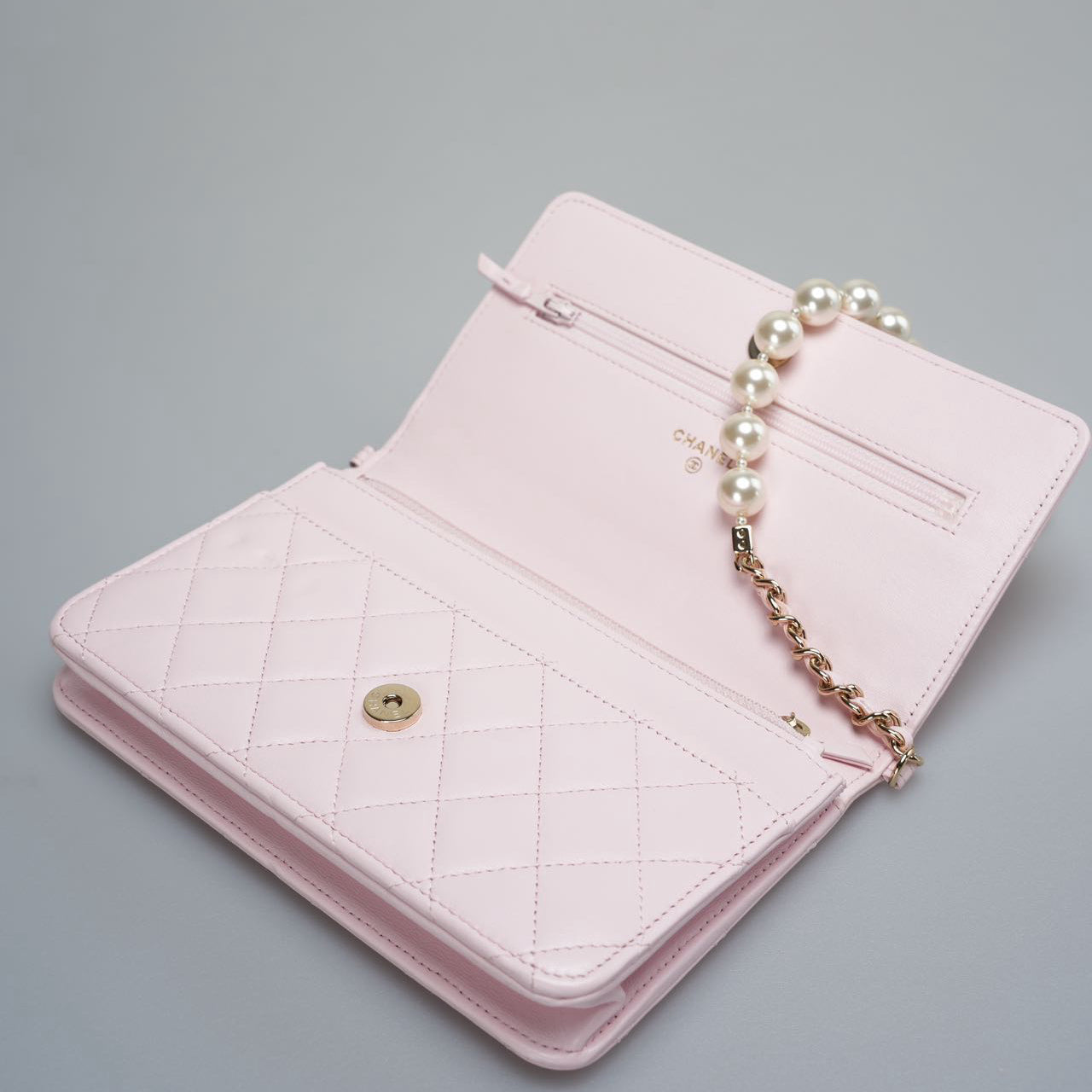 Chanel Baby Pink Wallet on Chain (WOC) in Quilted Lambskin with Pearl Chain – Gold Hardware
