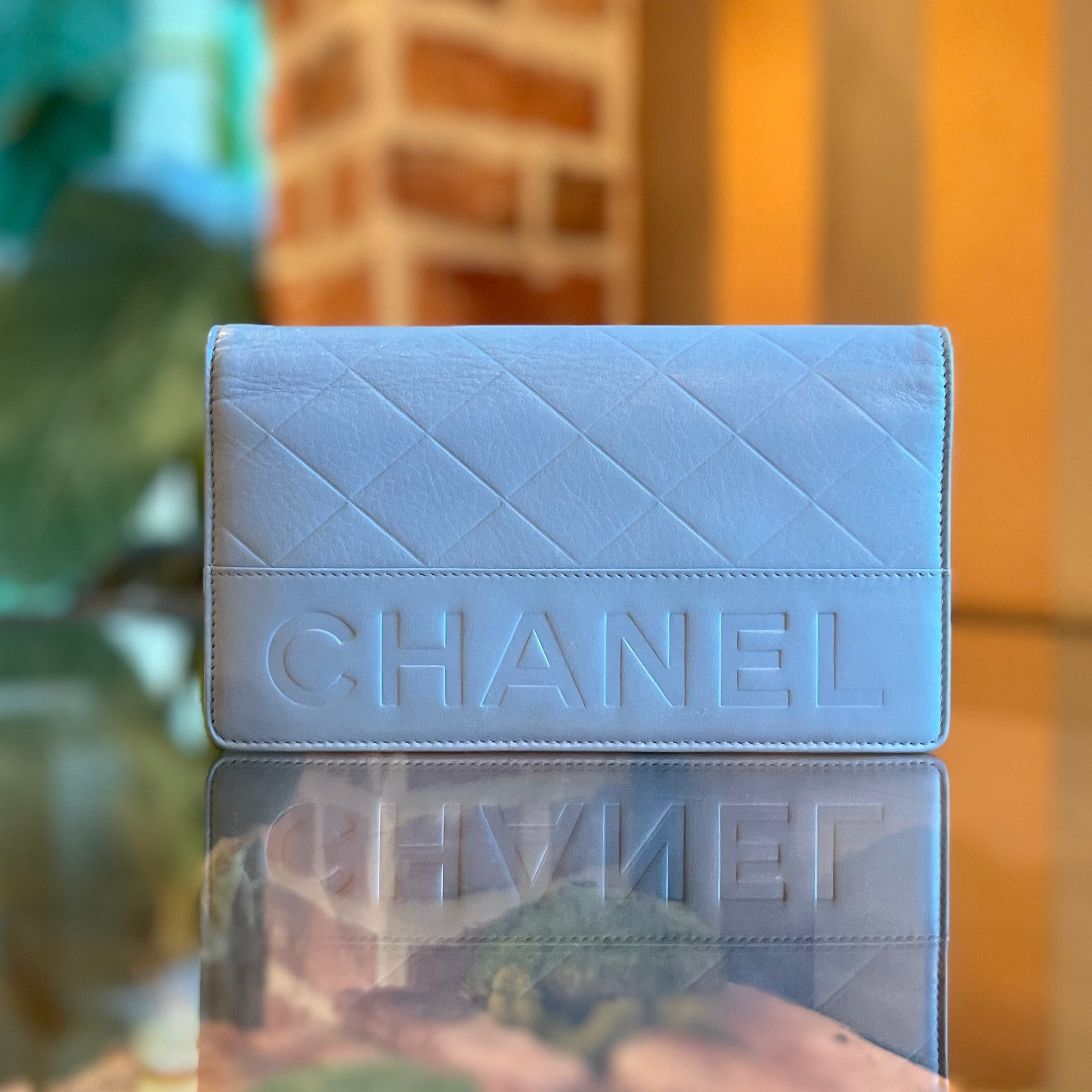 CHANEL Logo Flap Blue Quilted Wallet