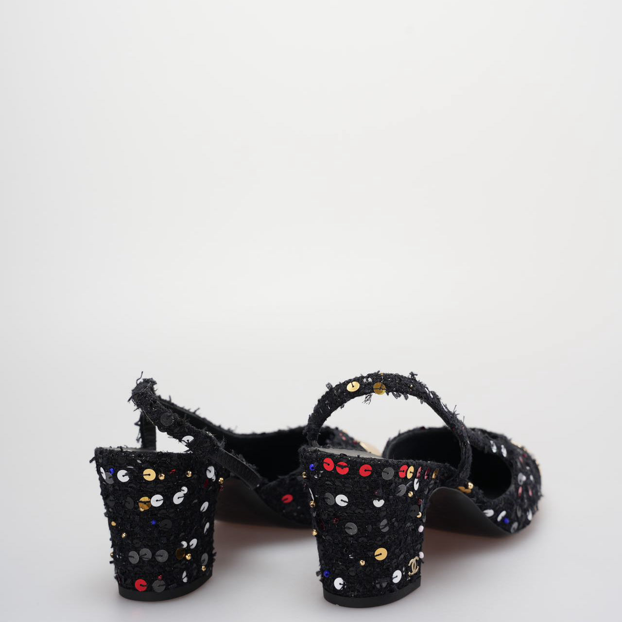 Chanel Tweed Lambskin Sequin Cap Toe CC Slingback Pumps size 39 in Black and Gold