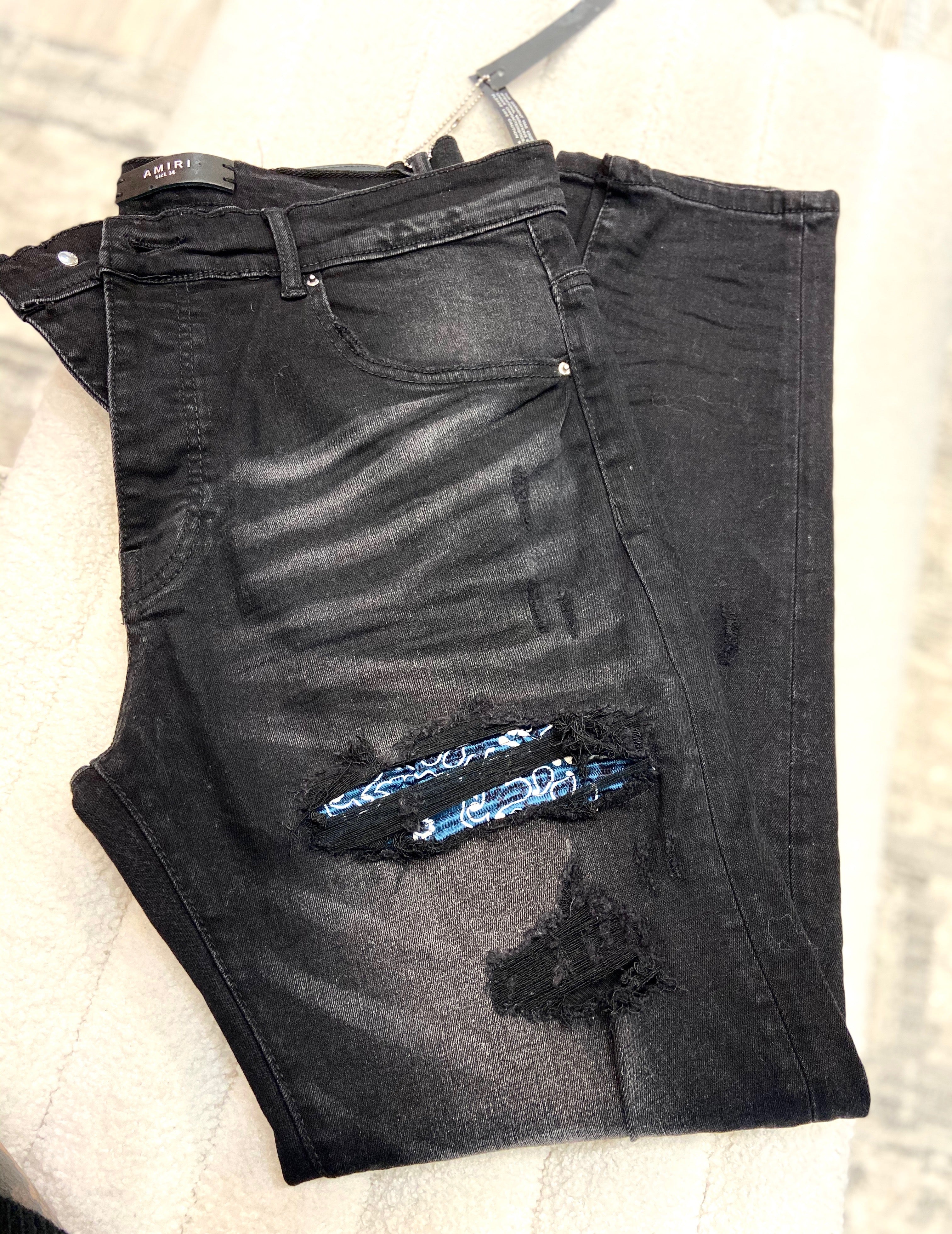 AMIRI DISTRESSED DENIM JEANS