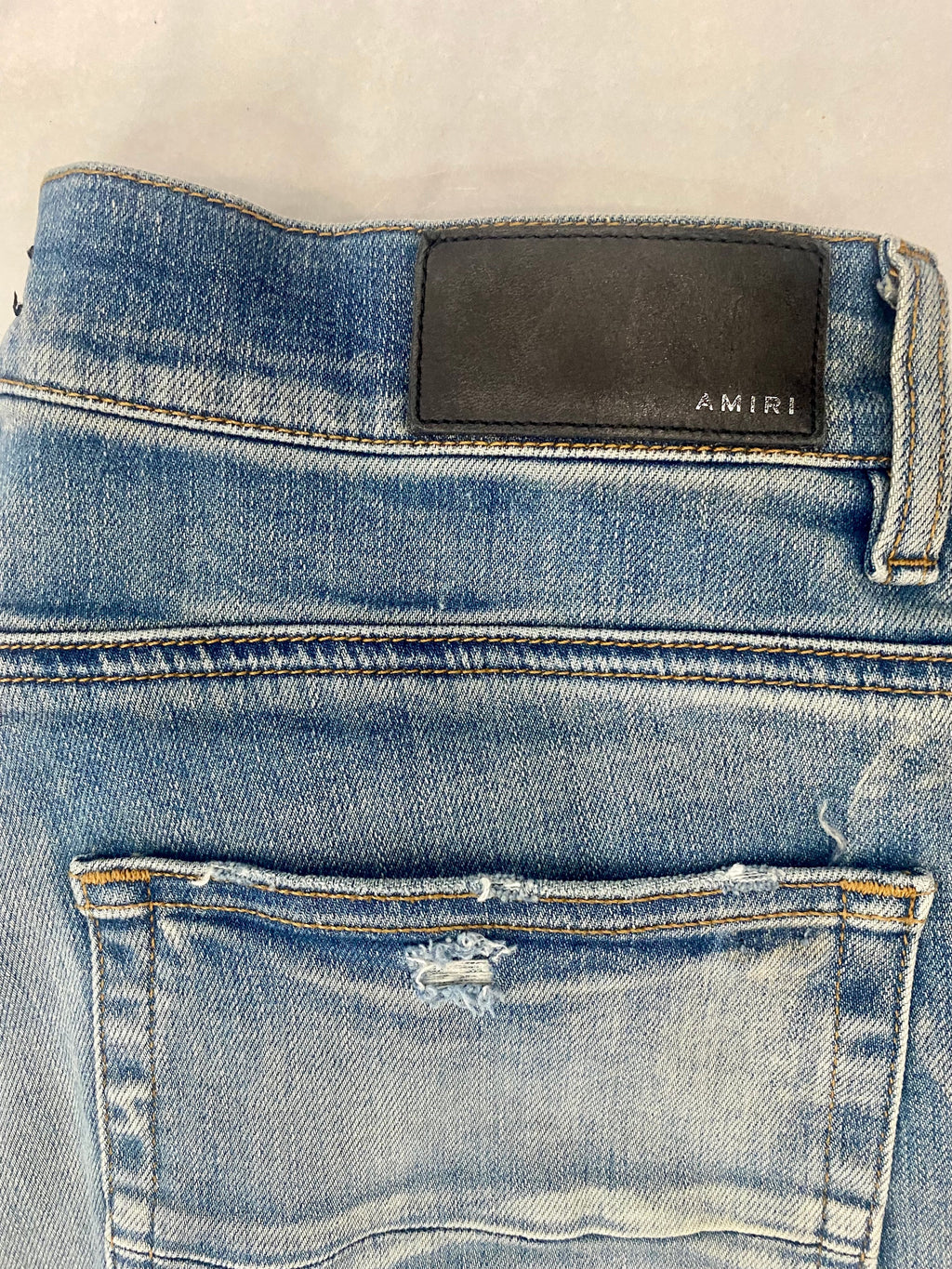 AMIRI DISTRESSED SCREEN PRINT BANDANA JEANS