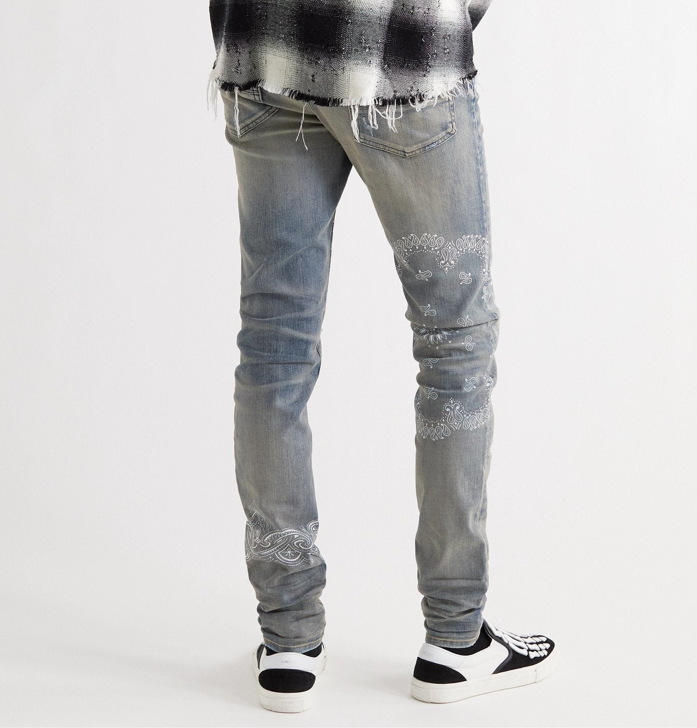 AMIRI DISTRESSED SCREEN PRINT BANDANA JEANS