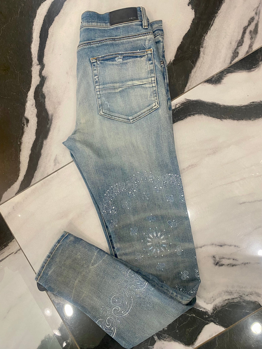 AMIRI DISTRESSED SCREEN PRINT BANDANA JEANS