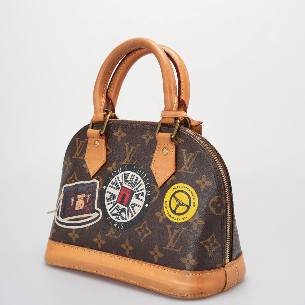 Louis Vuitton Monogram World Tour Alma BB Satchel Bag