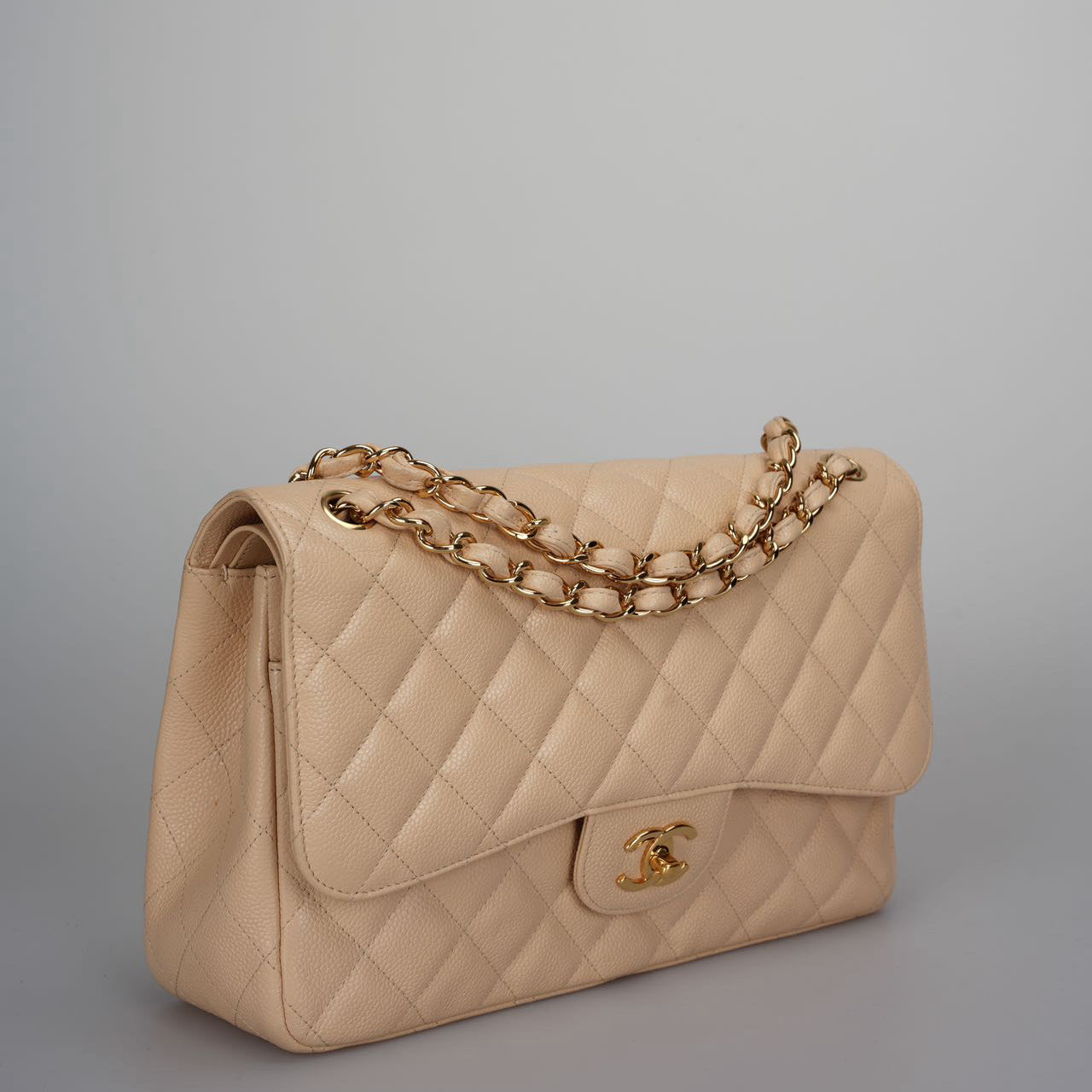 Chanel Classic Double Flap Bag Jumbo in Beige Quilted Caviar Leather with Gold Hardware